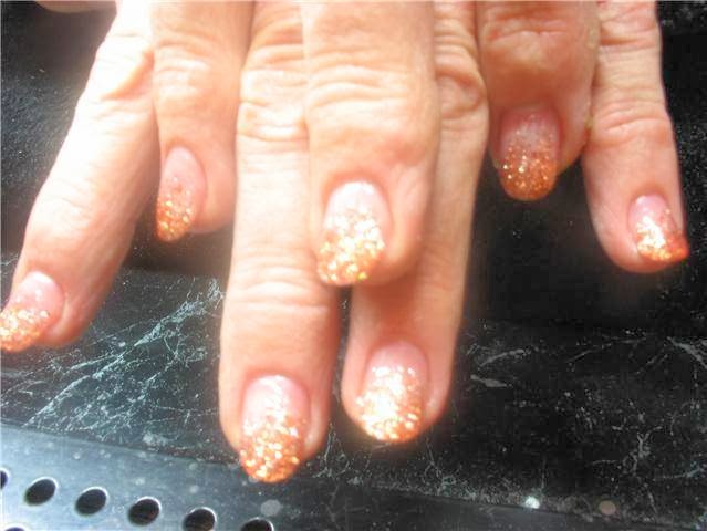 Oranje glitter ombré nagels